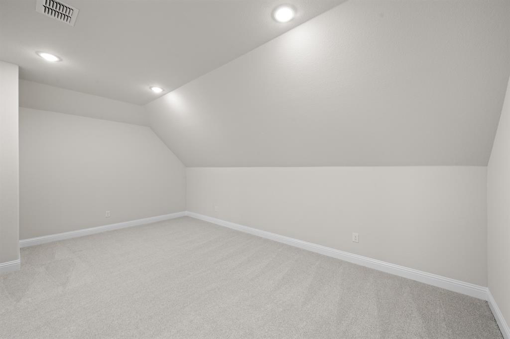 705 Seahawk Street Joshua, TX 76058 - Photo 25 of 28 DFW-Mockingbird Hills-Concept 3473-705 Seahawk Street-Media Room-Risewell Homes-1