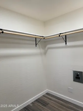 a view of a room with racks on the wall