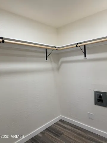 a view of a room with racks on the wall