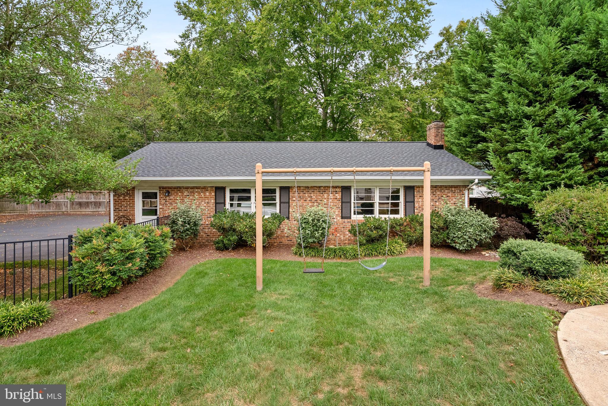 10 Crouch Street Sterling, VA 20165 - Photo 81 of 97 a aerial view of a house with a yard table and chairs
