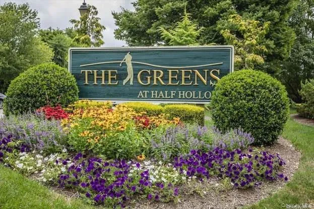a view of a water fountain in front of the house