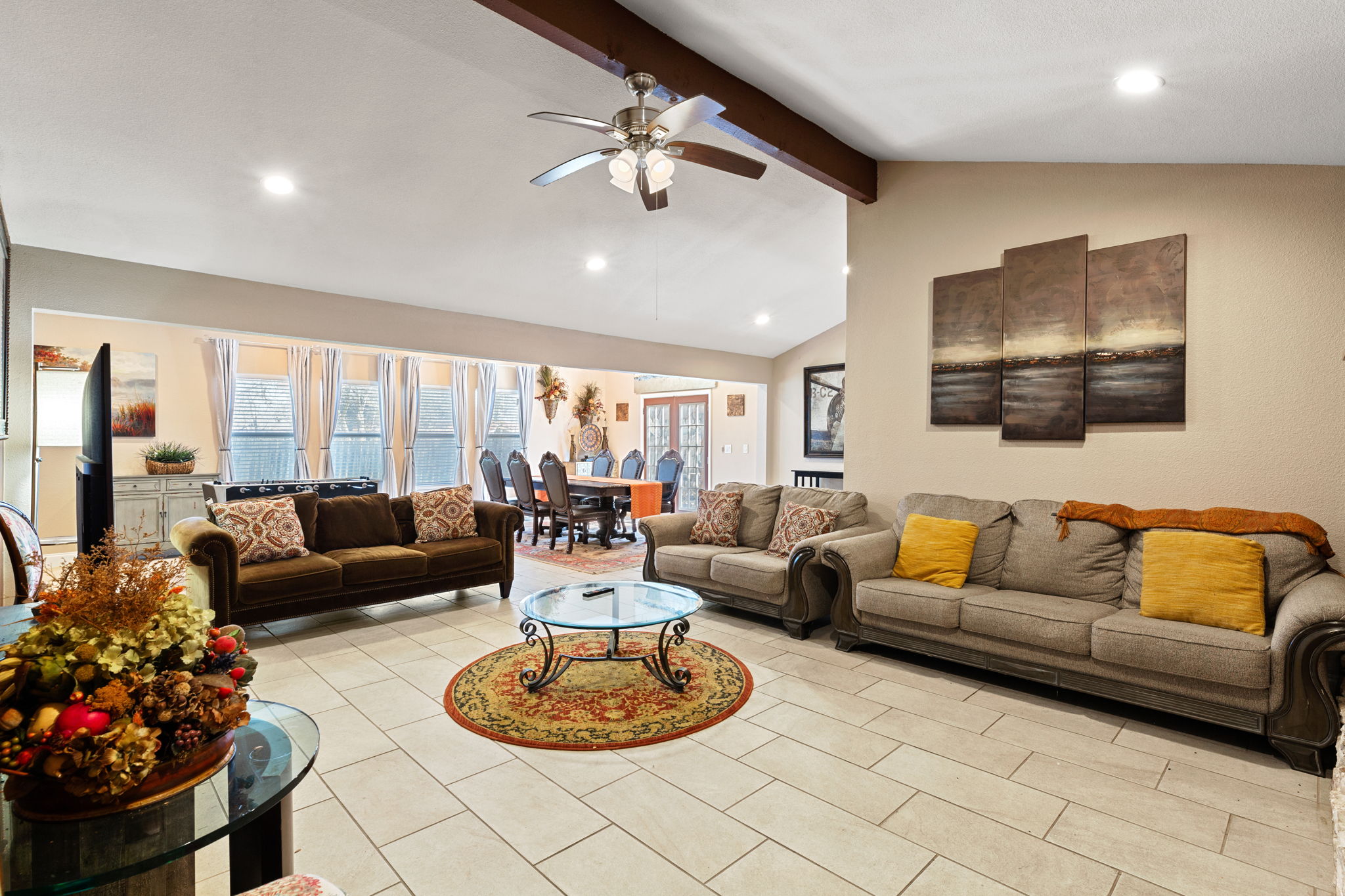 1602 Plateau Ridge Cedar Park, TX 78613 - Photo 8 of 29 Living room featuring ceiling fan, recessed lighting, lofted ceiling, and light tile patterned floors