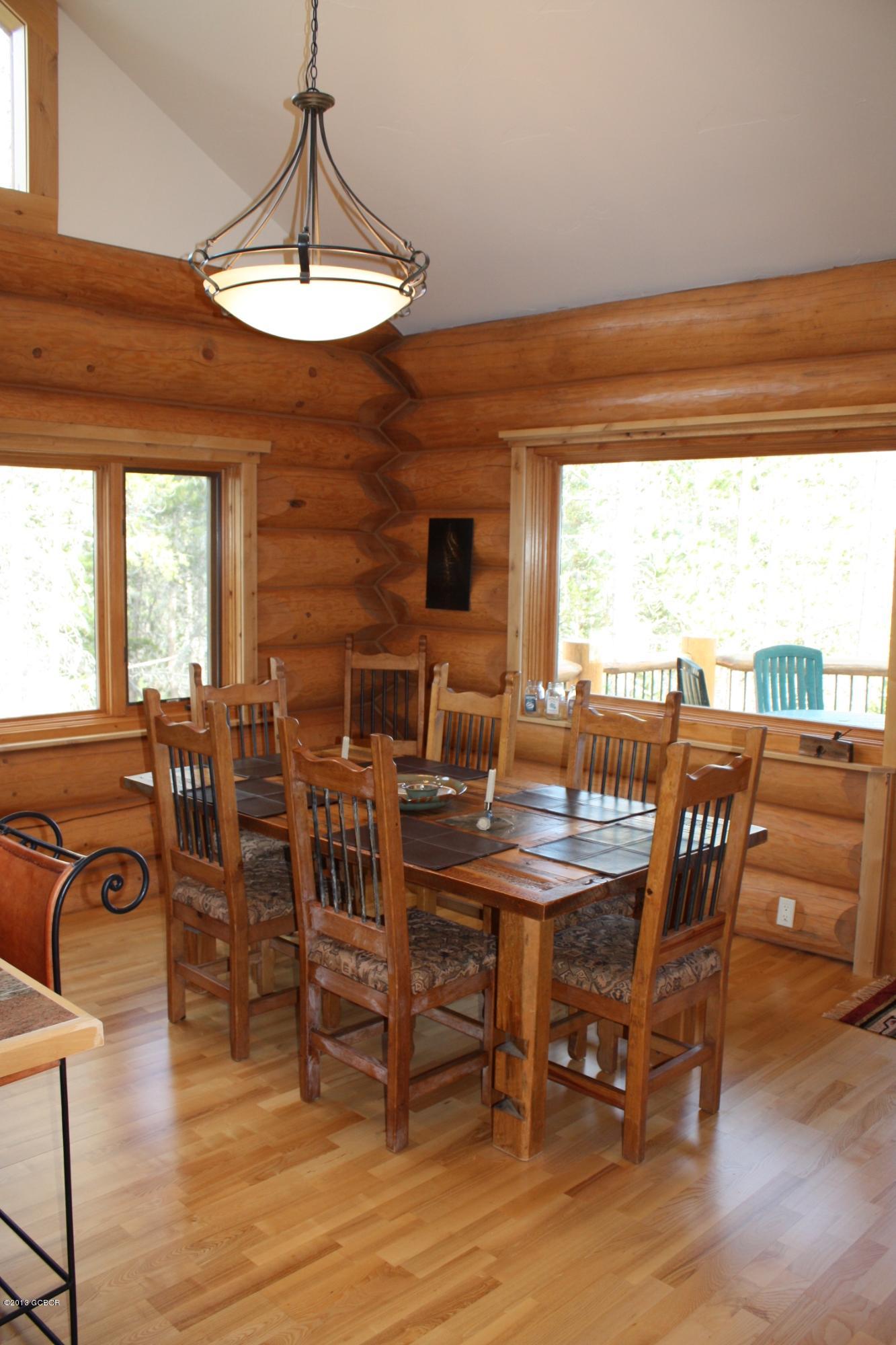 763 County Road Granby, CO 80446 - Photo 11 of 31 a view of a dining room with furniture window and wooden floor