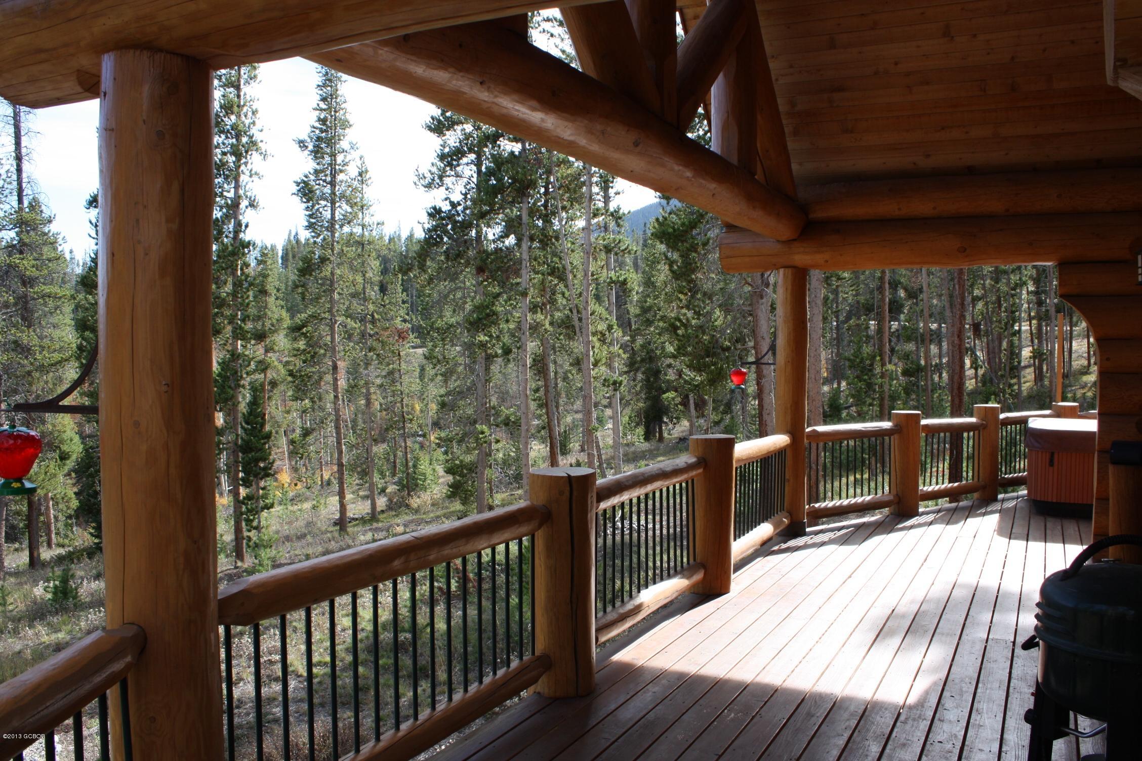 763 County Road Granby, CO 80446 - Photo 12 of 31 a view of a balcony with chairs and wooden floor