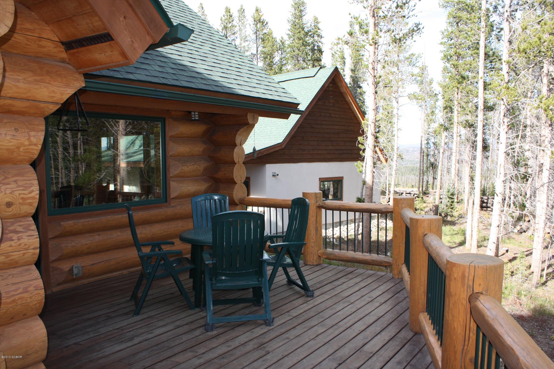 763 County Road Granby, CO 80446 - Photo 14 of 31 a view of a dinning table and chairs in patio of the house