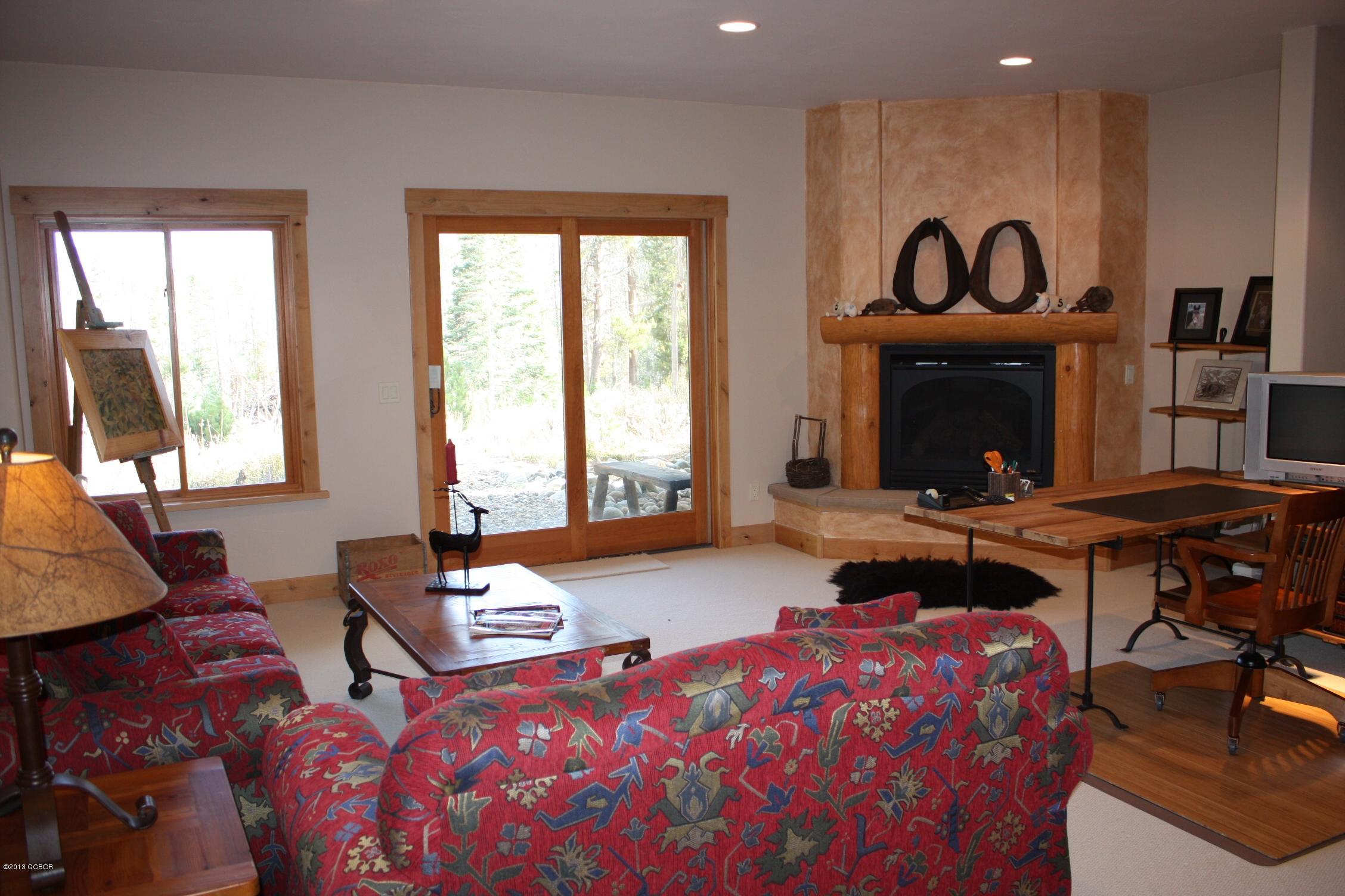 763 County Road Granby, CO 80446 - Photo 16 of 31 a bedroom with two beds and a large window