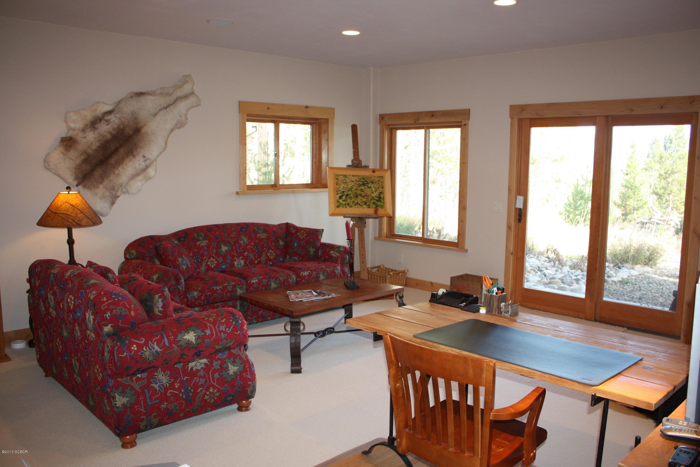763 County Road Granby, CO 80446 - Photo 17 of 31 a living room with furniture and a window