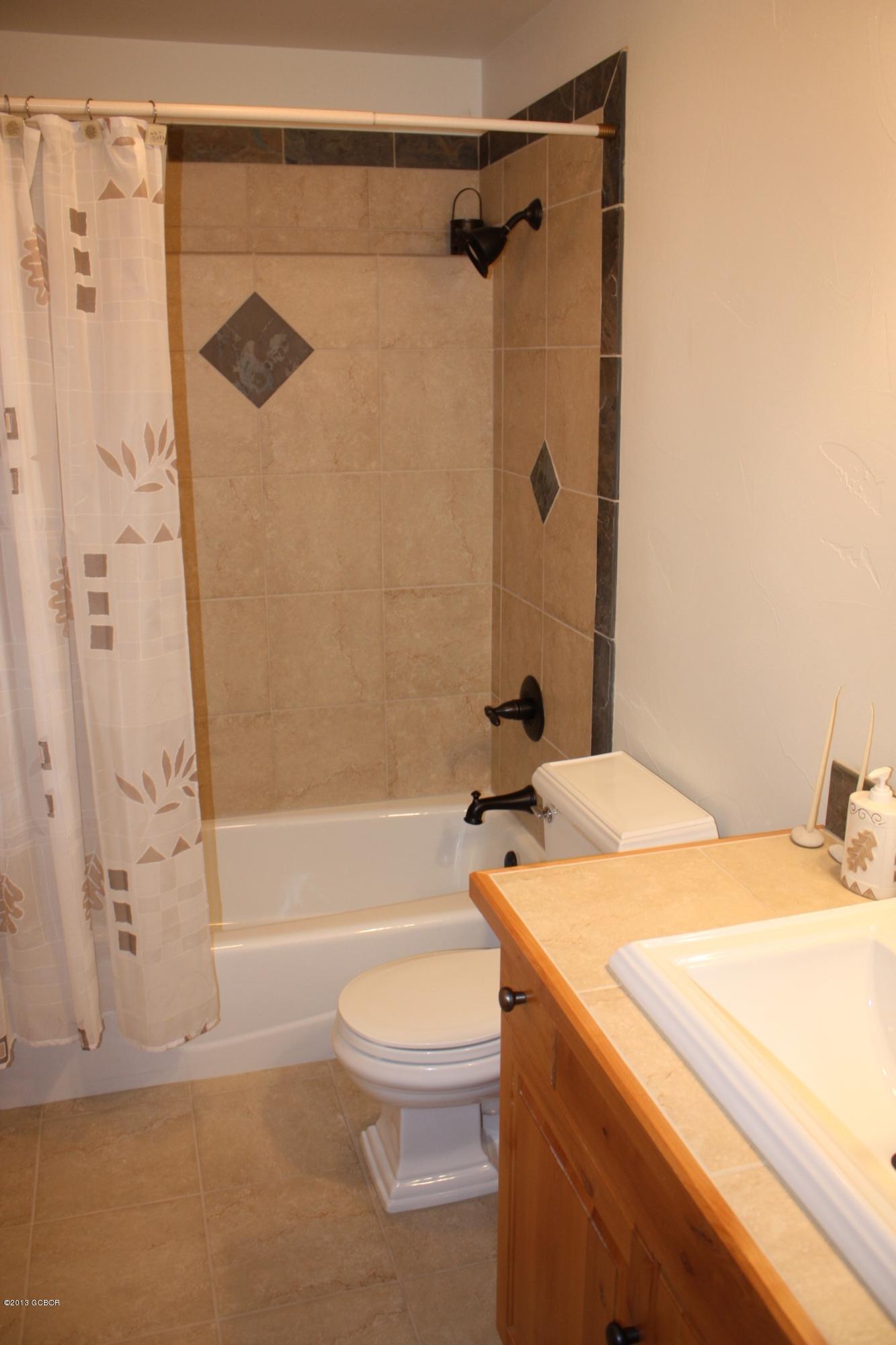 763 County Road Granby, CO 80446 - Photo 26 of 31 a bathroom with a sink a toilet and a bathtub