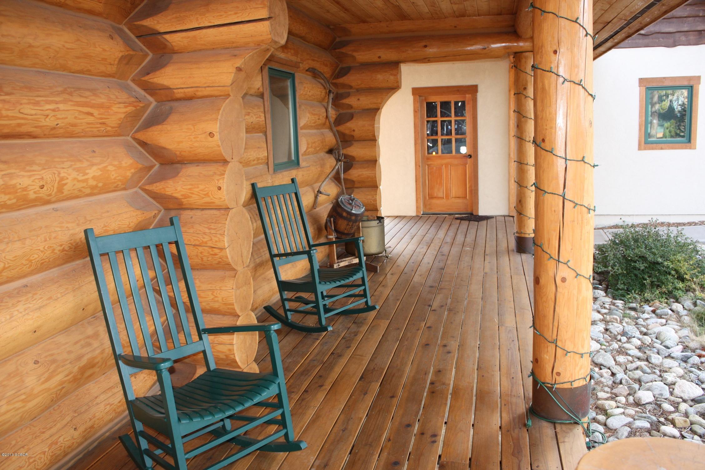 763 County Road Granby, CO 80446 - Photo 5 of 31 a view of a wooden chairs on the deck