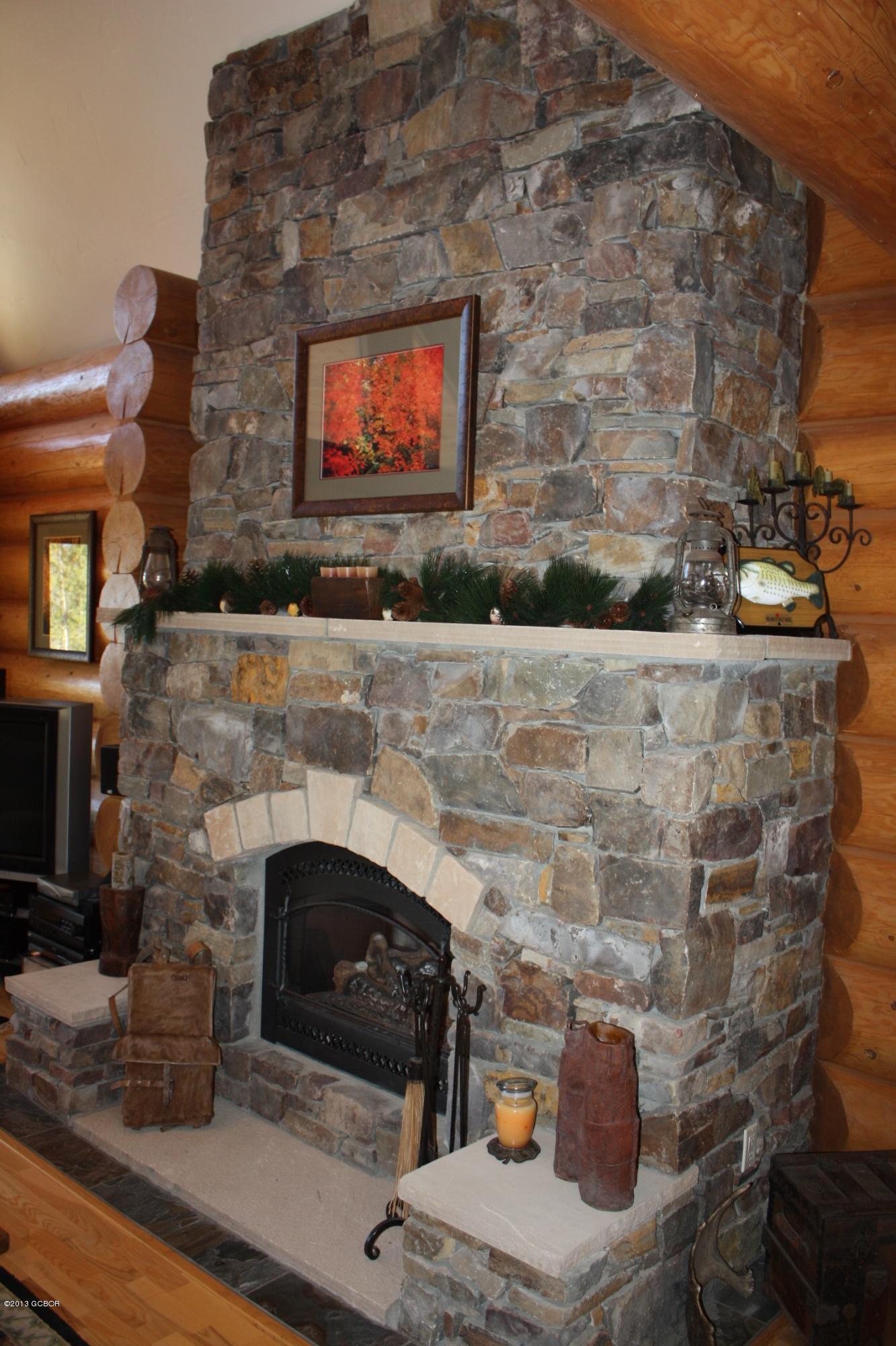 763 County Road Granby, CO 80446 - Photo 9 of 31 a living room with furniture and a fireplace