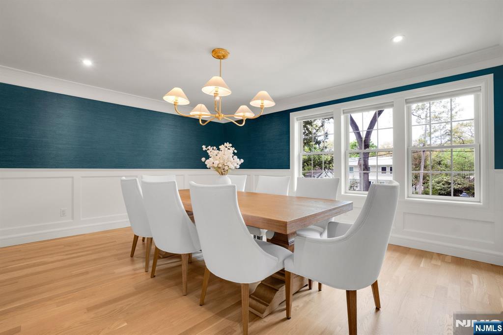 331 Wastena Terrace Ridgewood, NJ 07450 - Photo 17 of 49 a view of a dining room with furniture window and wooden floor