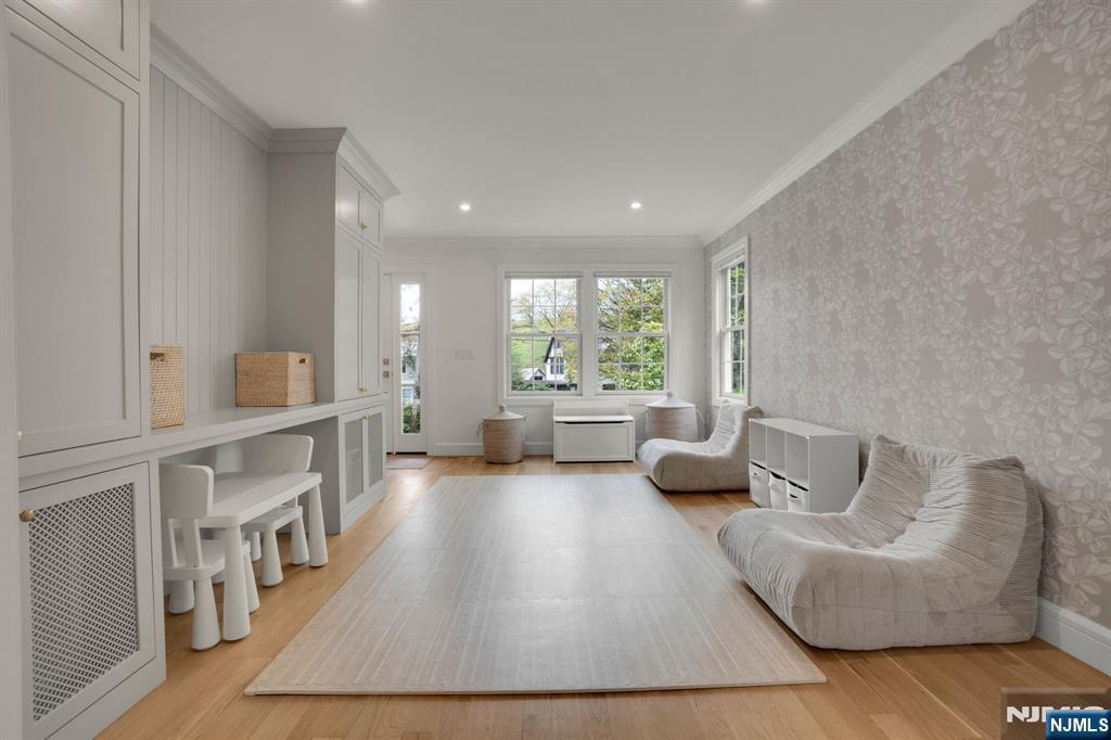331 Wastena Terrace Ridgewood, NJ 07450 - Photo 21 of 49 a living room with furniture and a large window