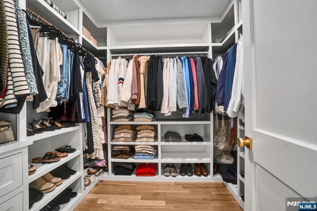 331 Wastena Terrace Ridgewood, NJ 07450 - Photo 26 of 49 a view of walk in closet with clothes and shoes