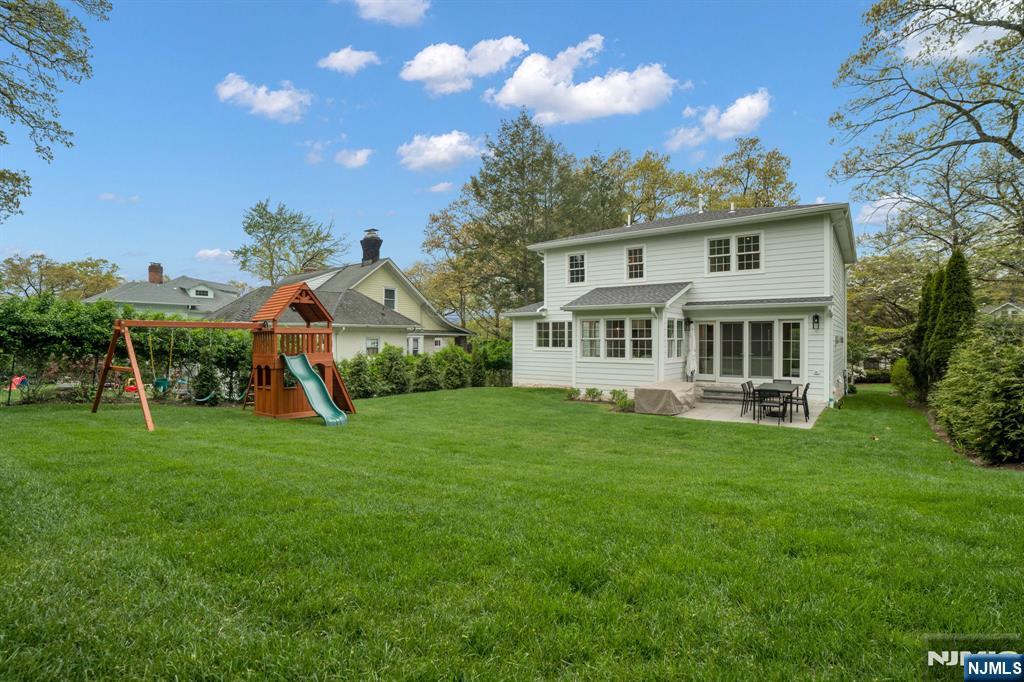 331 Wastena Terrace Ridgewood, NJ 07450 - Photo 47 of 49 a view of a house with a backyard