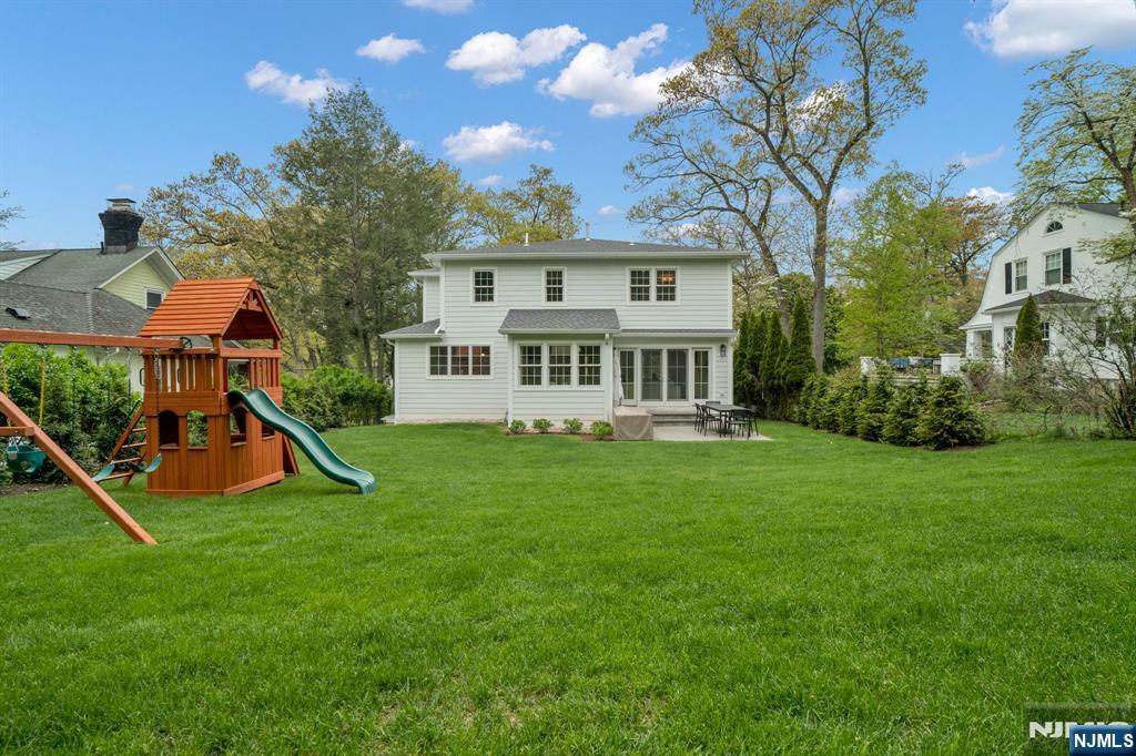 331 Wastena Terrace Ridgewood, NJ 07450 - Photo 48 of 49 a view of a house with a yard porch and sitting area
