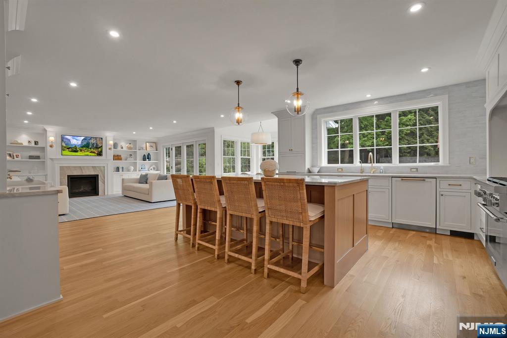 331 Wastena Terrace Ridgewood, NJ 07450 - Photo 6 of 49 a view of a dining room with furniture window and wooden floor