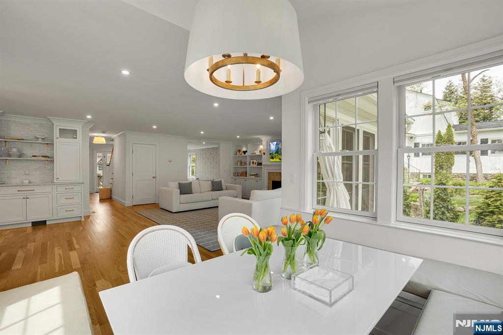 331 Wastena Terrace Ridgewood, NJ 07450 - Photo 9 of 49 a dining room with furniture and a large window