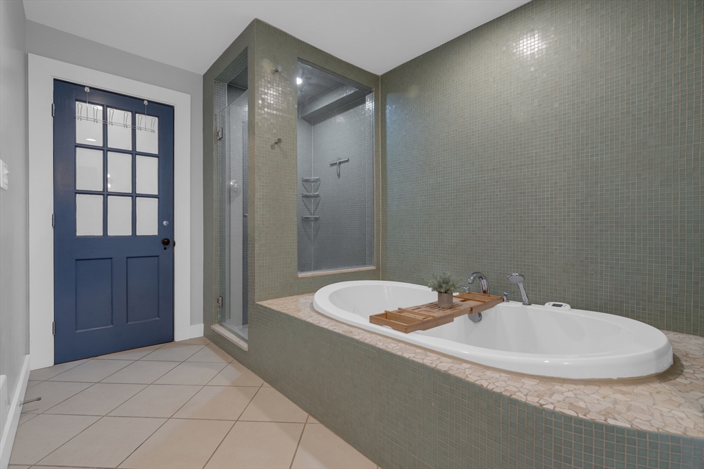 9 Appleton Street, Unit M1 Boston, MA 02116 - Photo 16 of 24 a bathroom with a sink and a mirror