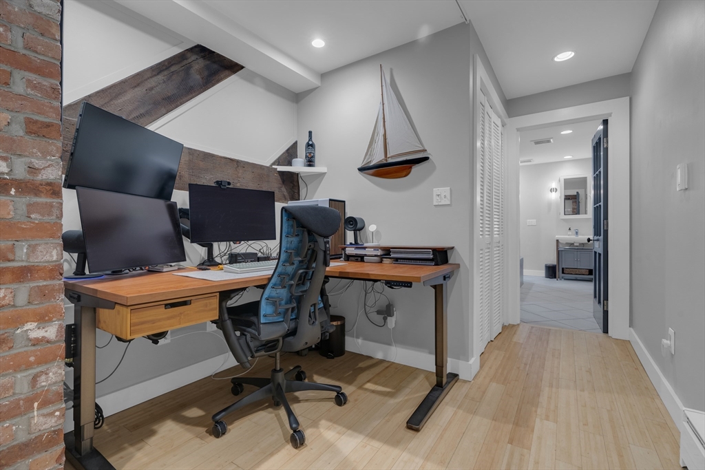 9 Appleton Street, Unit M1 Boston, MA 02116 - Photo 17 of 24 a view of a workspace with furniture
