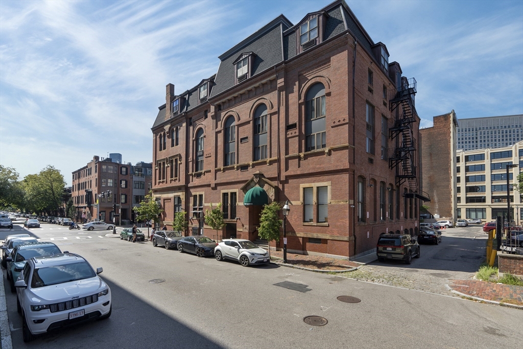 9 Appleton Street, Unit M1 Boston, MA 02116 - Photo 21 of 24 a car parked in front of a brick building