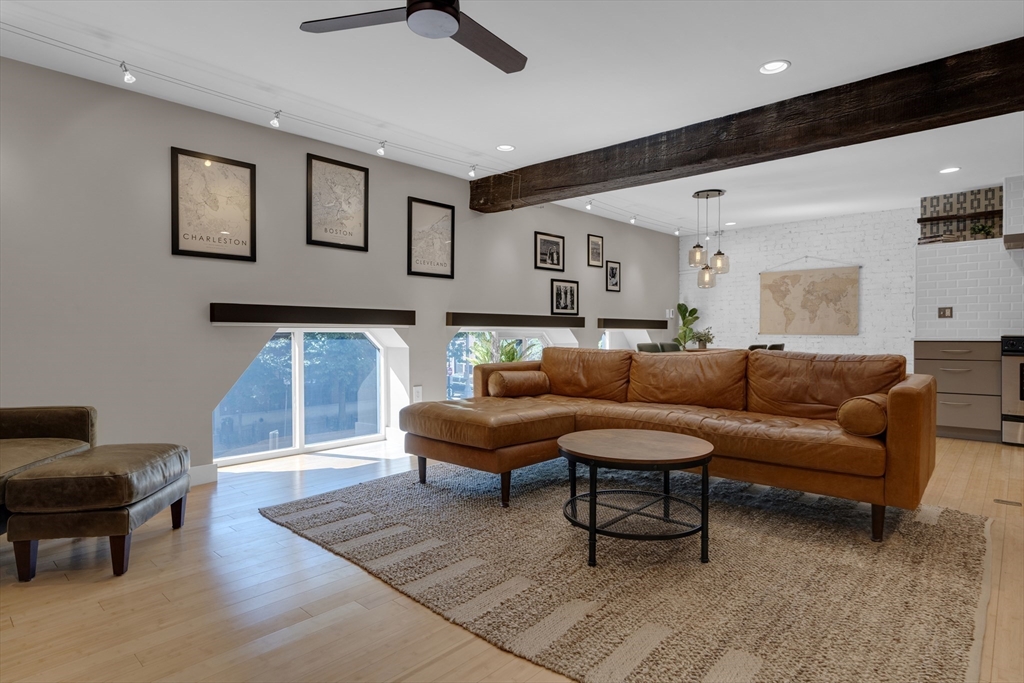 9 Appleton Street, Unit M1 Boston, MA 02116 - Photo 3 of 24 a living room with furniture and a rug