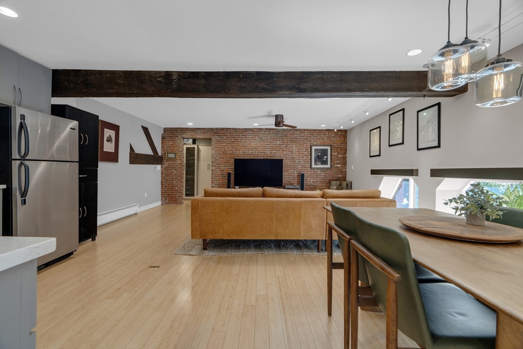 9 Appleton Street, Unit M1 Boston, MA 02116 - Photo 7 of 24 a living room with furniture and a table