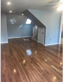 847 Washington Street, Unit 2FRONT Canton, MA 02021 - Photo 10 of 14 a view of a hallway with wooden floor