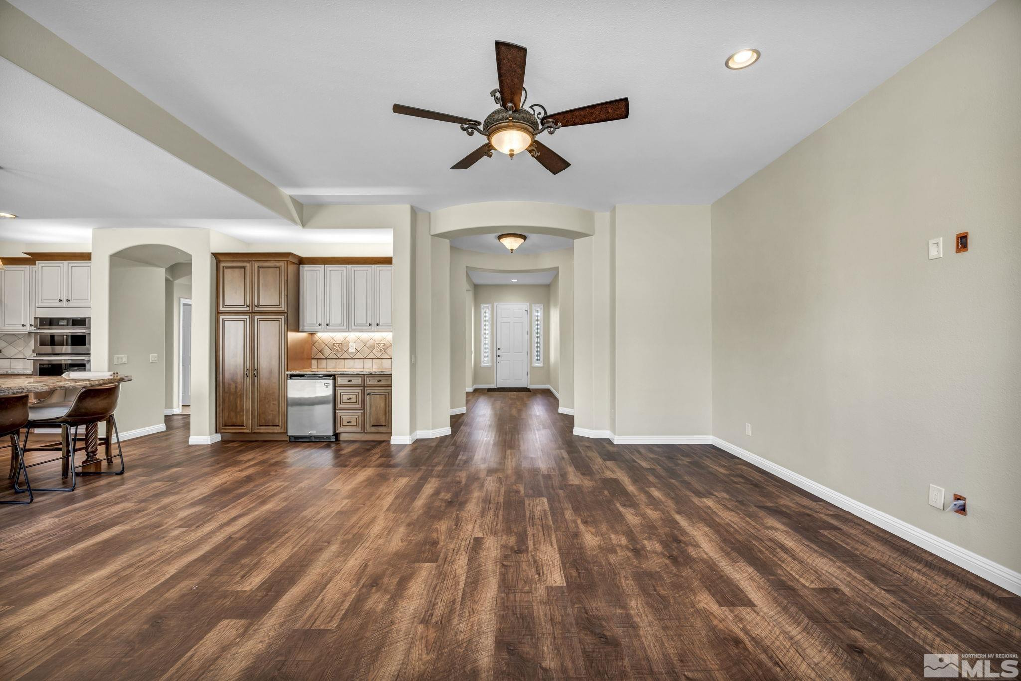 3471 Forest View Court Reno, NV 89511 - Photo 28 of 38 a view of empty room with wooden floor and fan