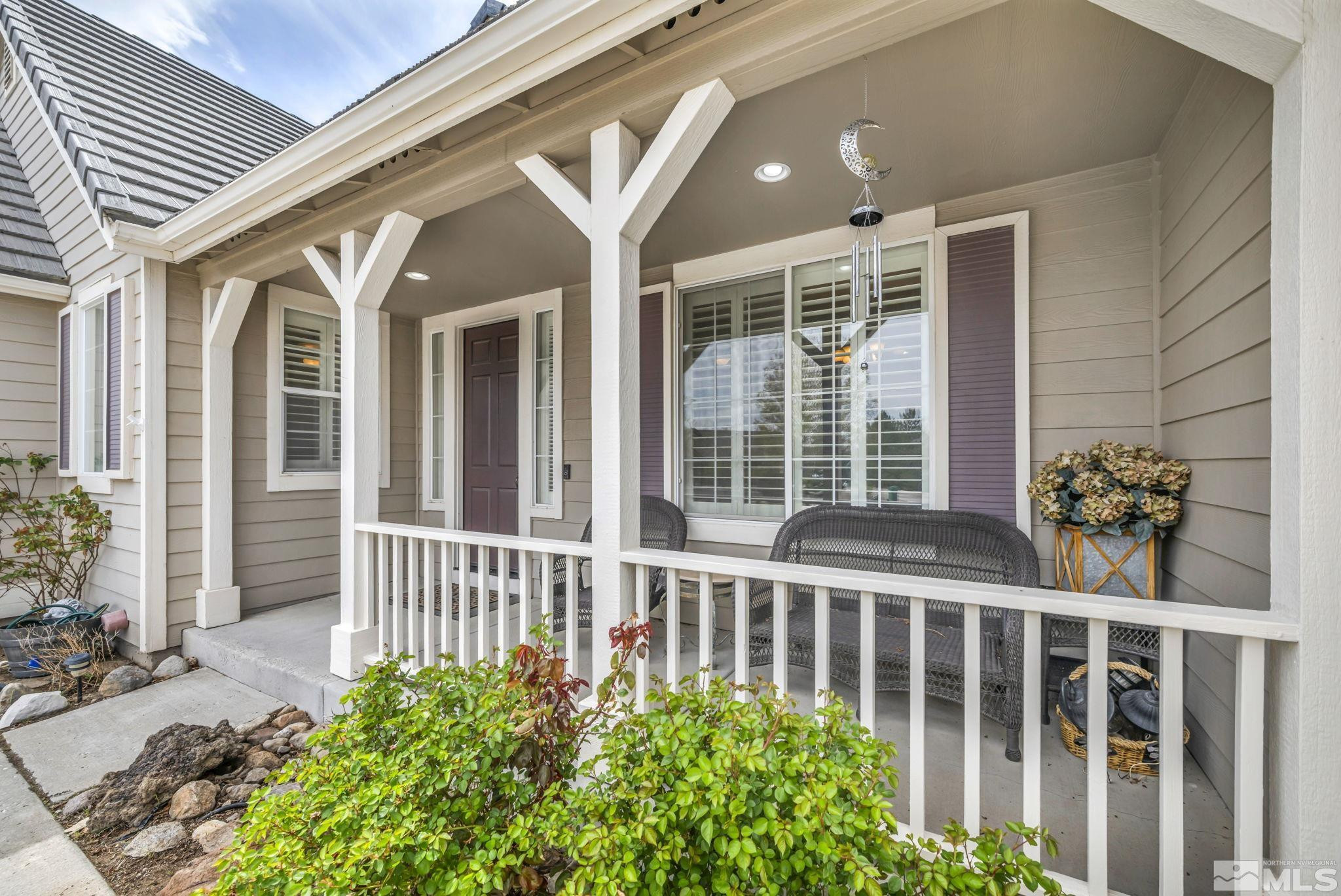 3471 Forest View Court Reno, NV 89511 - Photo 3 of 38 a view of a house with porch and wooden floor