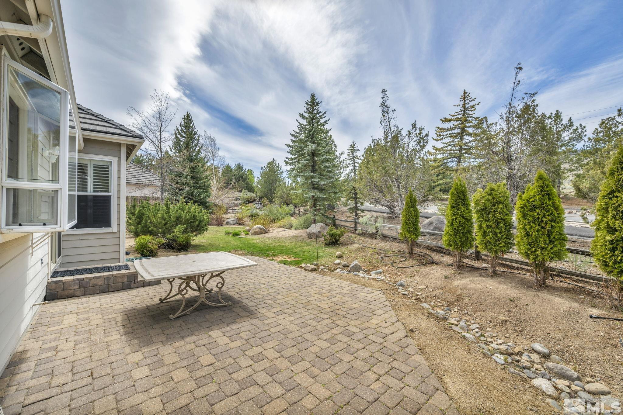 3471 Forest View Court Reno, NV 89511 - Photo 36 of 38 a view of a backyard with sitting area