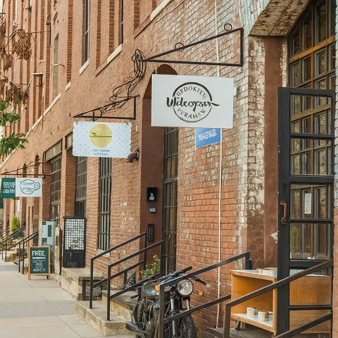 a sign on a pole on a street