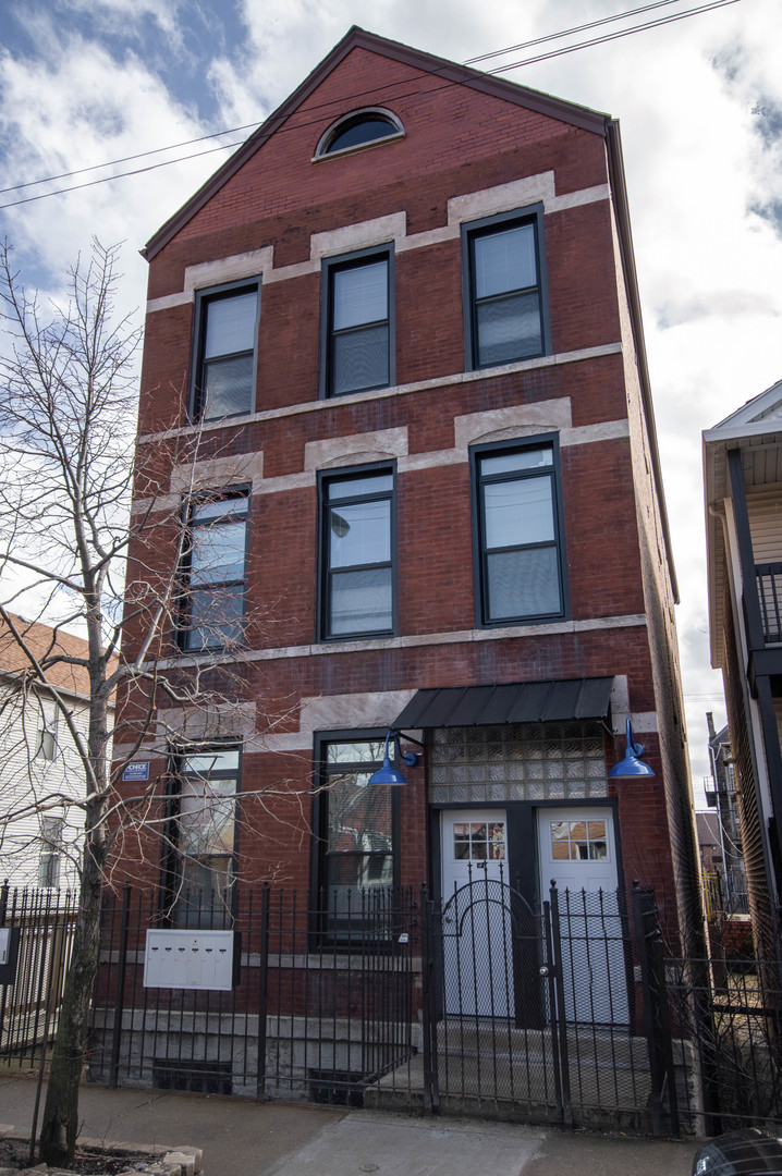 2117 West 18th Street, Unit 1R Chicago, IL 60608 - Photo 1 of 8 a front view of a building