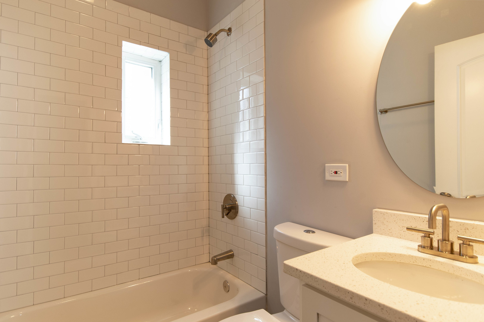 2117 West 18th Street, Unit 1R Chicago, IL 60608 - Photo 7 of 8 a bathroom with a sink and a mirror