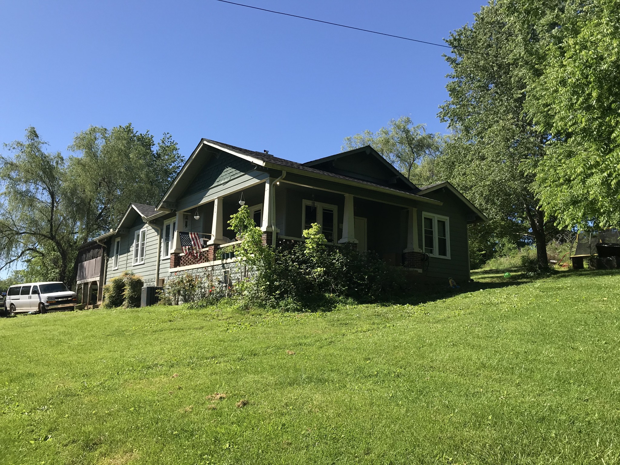 2850 Henry Gower Road Pleasant View, TN 37146 - Photo 1 of 22 a front view of house with yard and green space