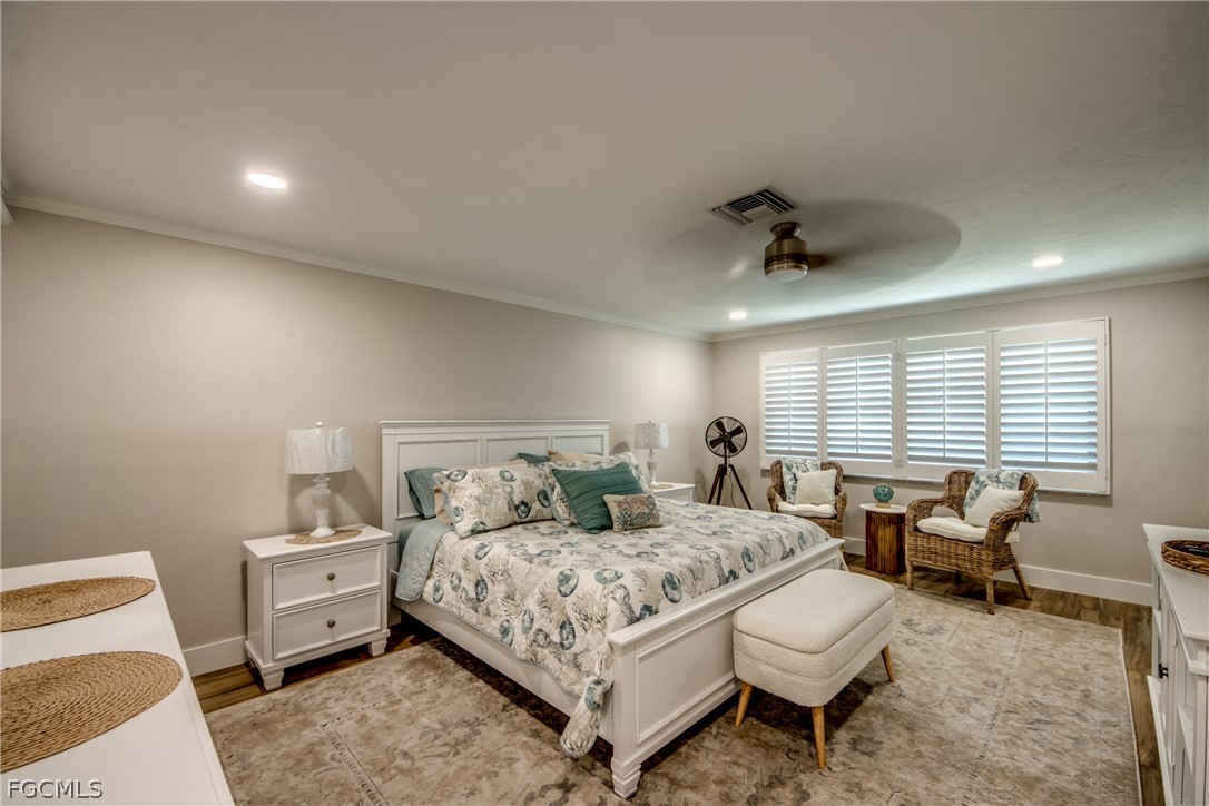 11599 Island Avenue Matlacha, FL 33993 - Photo 24 of 38 a living room with furniture and a window