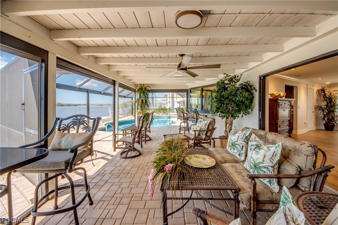 11599 Island Avenue Matlacha, FL 33993 - Photo 27 of 38 a view of a dining room with furniture window and outside view