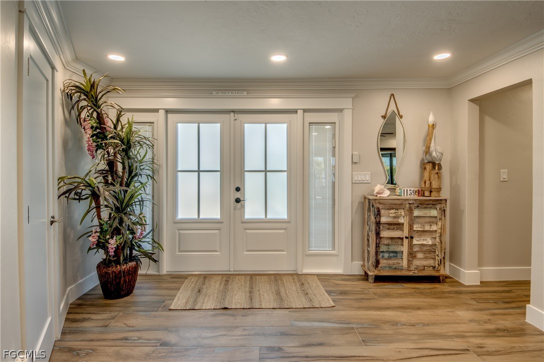 11599 Island Avenue Matlacha, FL 33993 - Photo 5 of 38 a view of a entryway door of the room