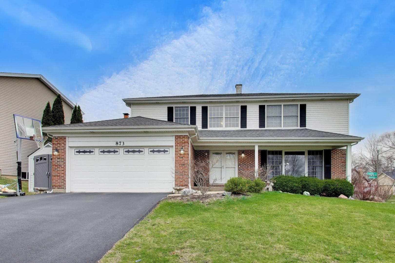 873 Hampton Drive Carol Stream, IL 60188 - Photo 1 of 43 front view of house with a yard