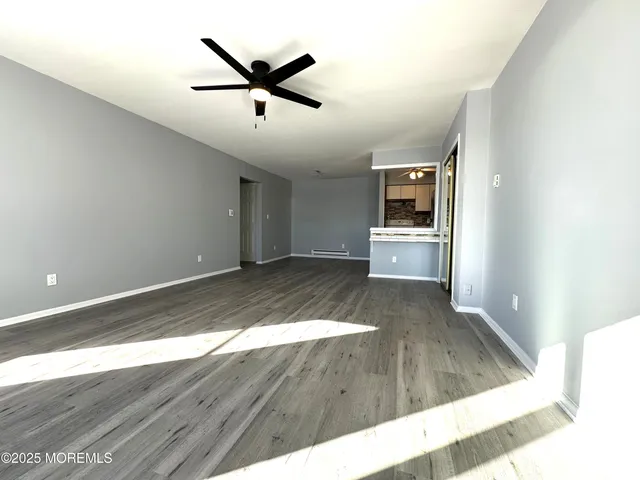 a view of a kitchen and a sink