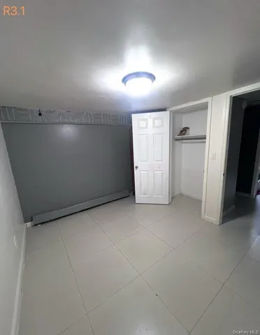 a kitchen with a stove a sink and a counter top space