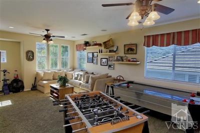1590 Hidden Ranch Drive Simi Valley, CA 93063 - Photo 14 of 23 a living room with lots of furniture and a chandelier