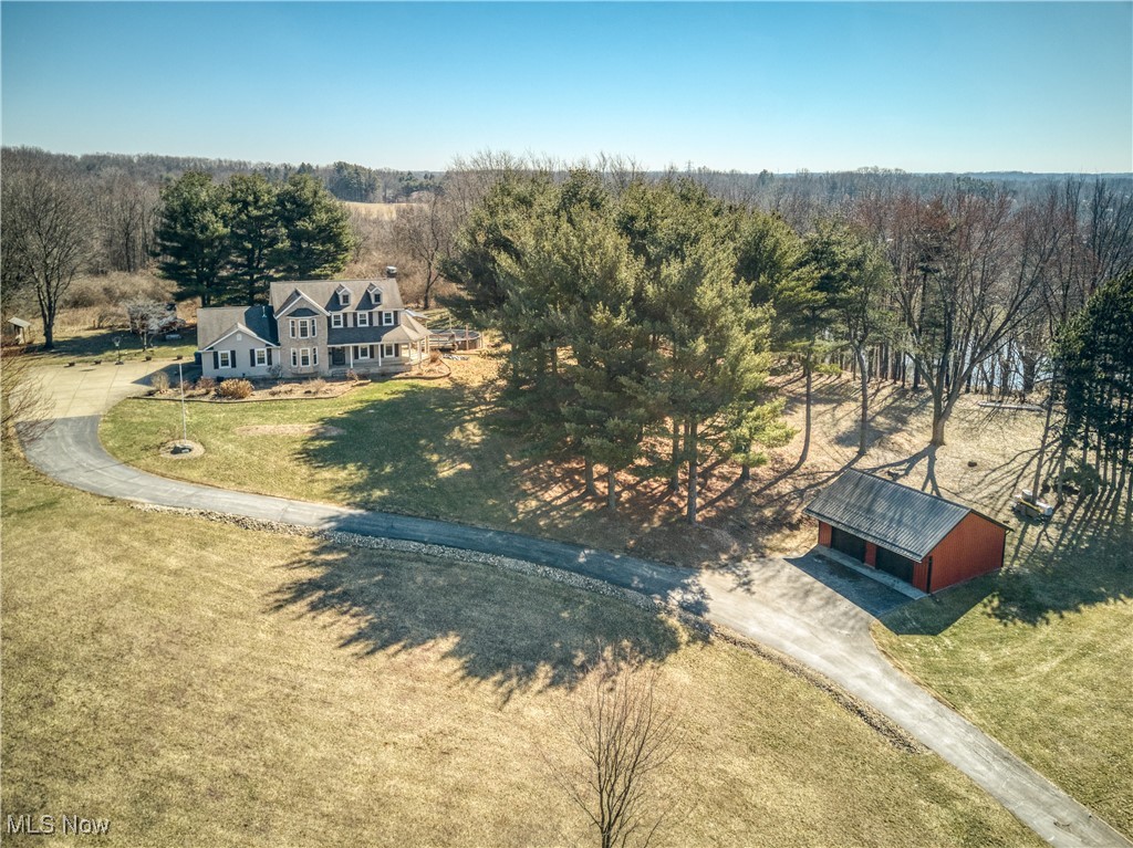 2061 Portage Line Road Mogadore, OH 44260 - Photo 2 of 48 Aerial view featuring a forest view