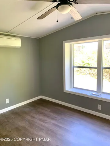 a view of a livingroom with a window