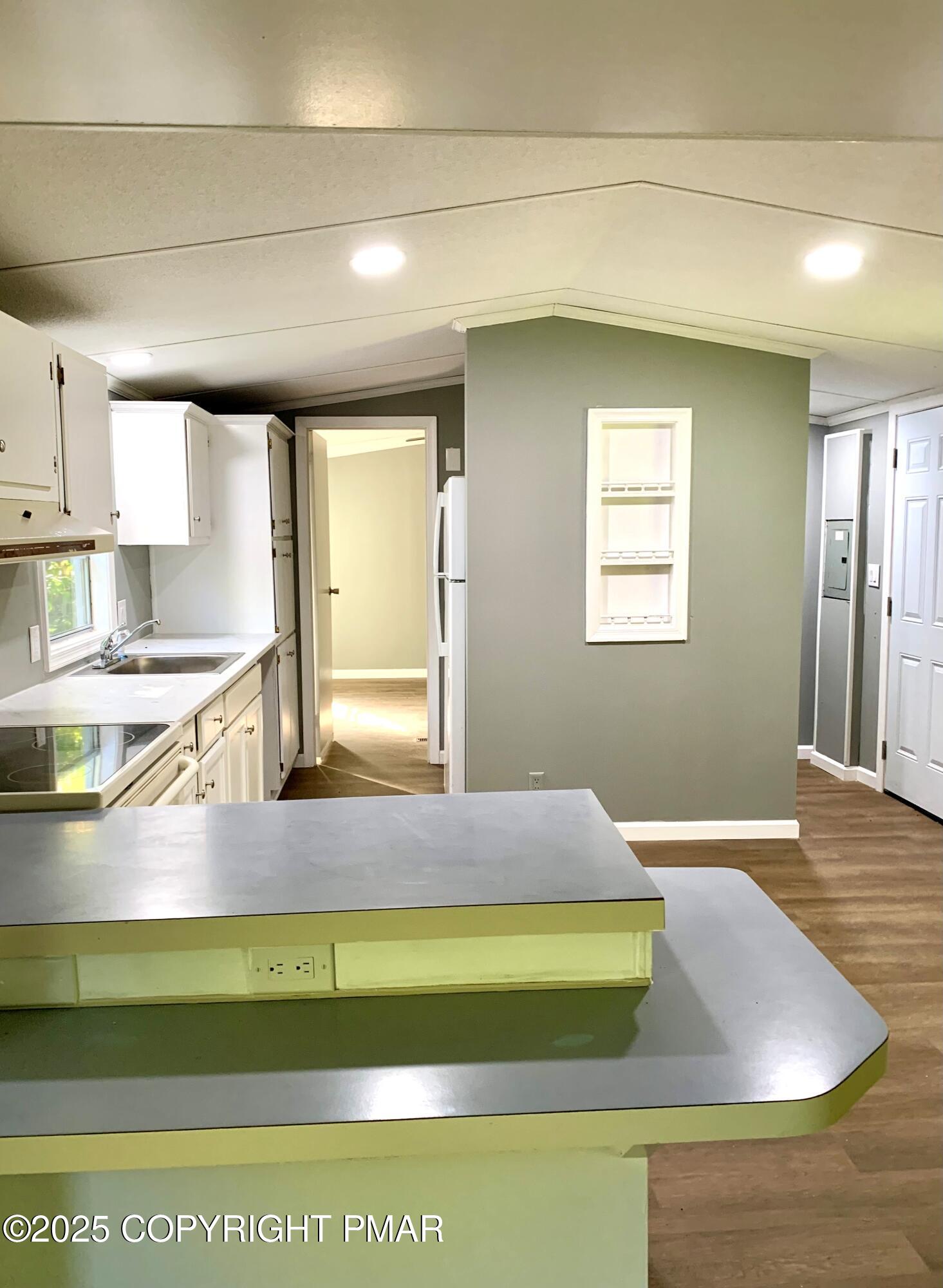 146 Paul Terrace Scotrun, PA 18355 - Photo 2 of 13 a view of kitchen with wooden floor