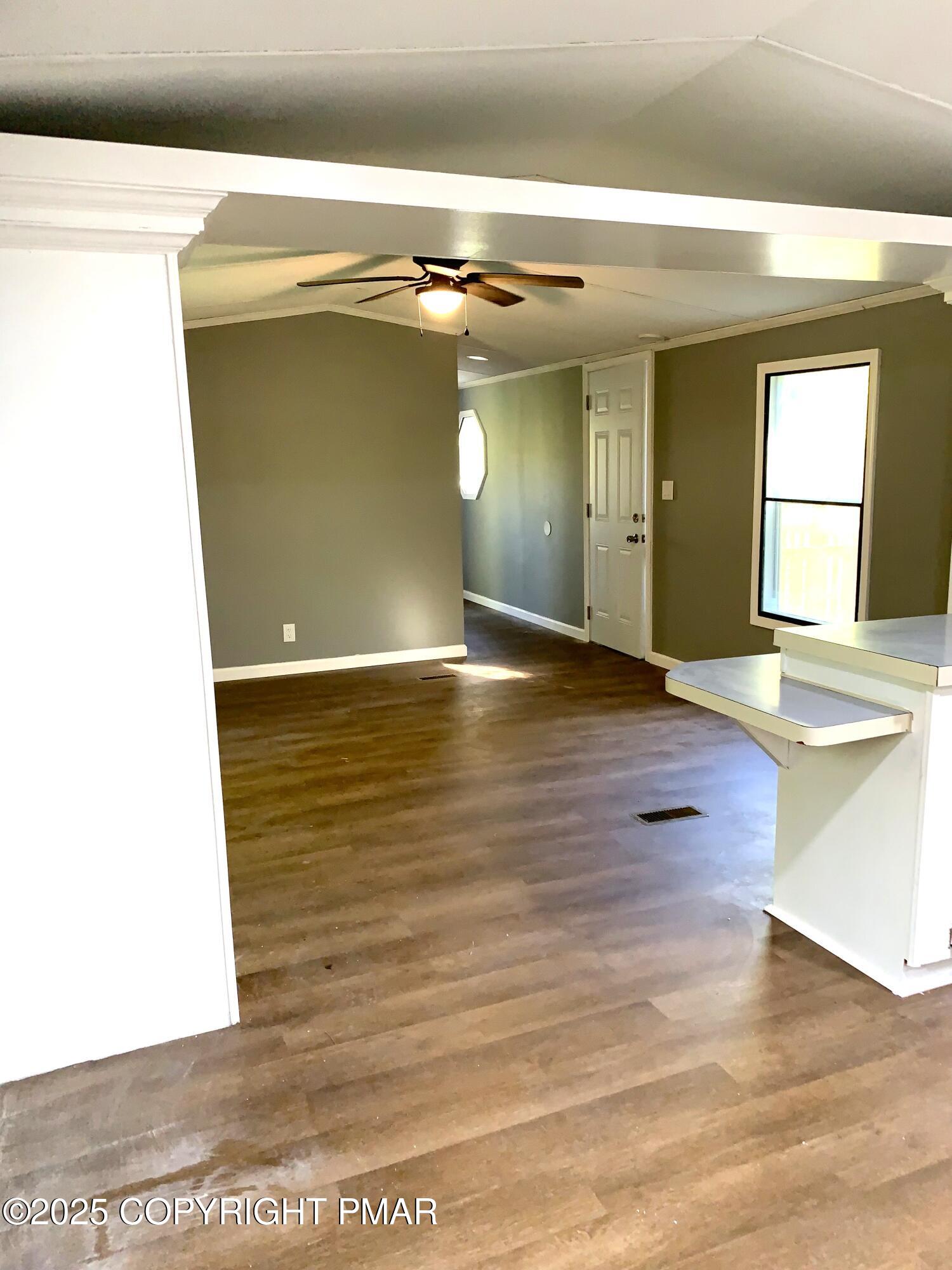 146 Paul Terrace Scotrun, PA 18355 - Photo 4 of 13 a view of a living room with a wooden floor