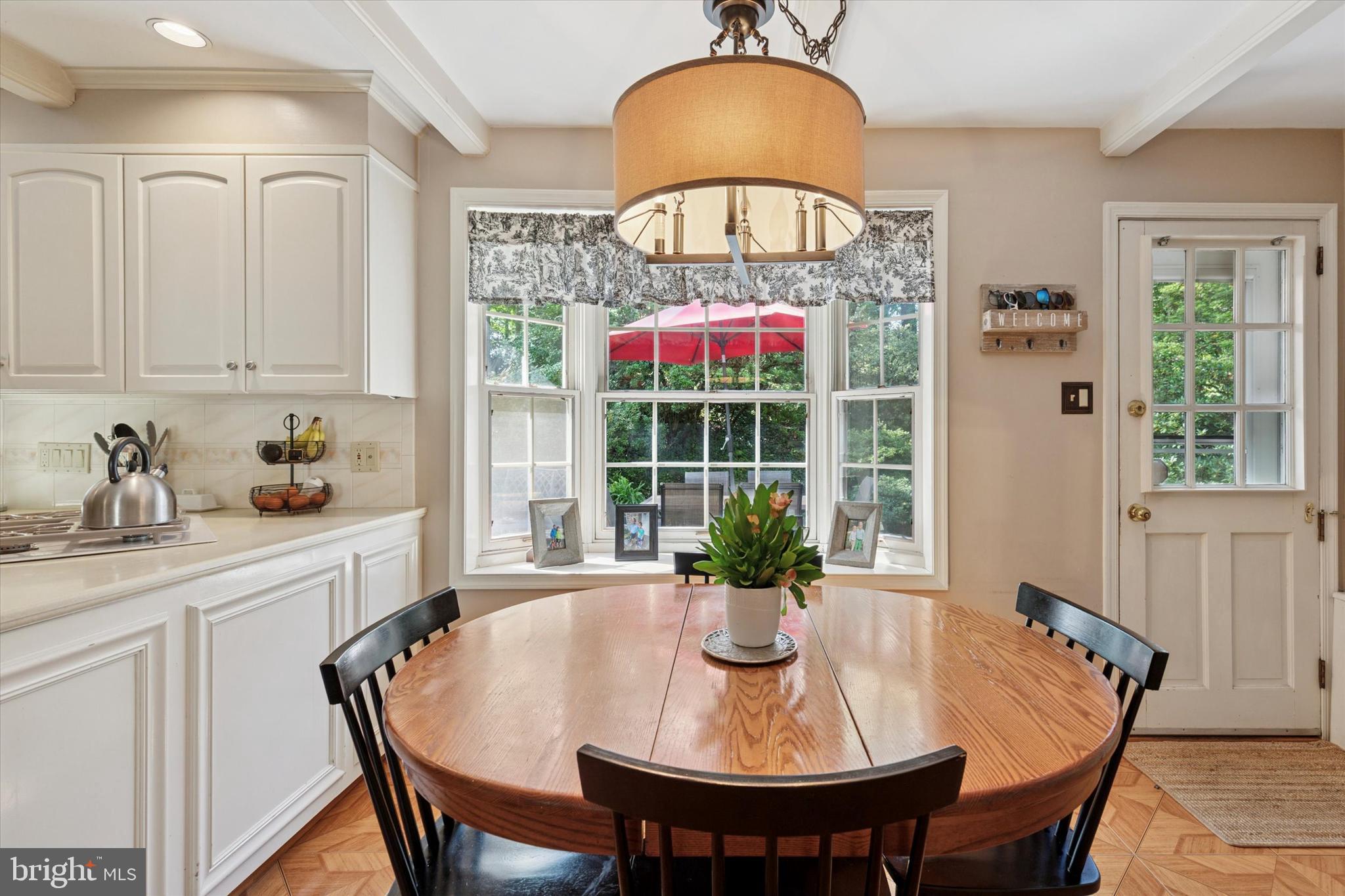 711 Custis Road Glenside, PA 19038 - Photo 16 of 53 a view of a dining room with furniture window and outside view
