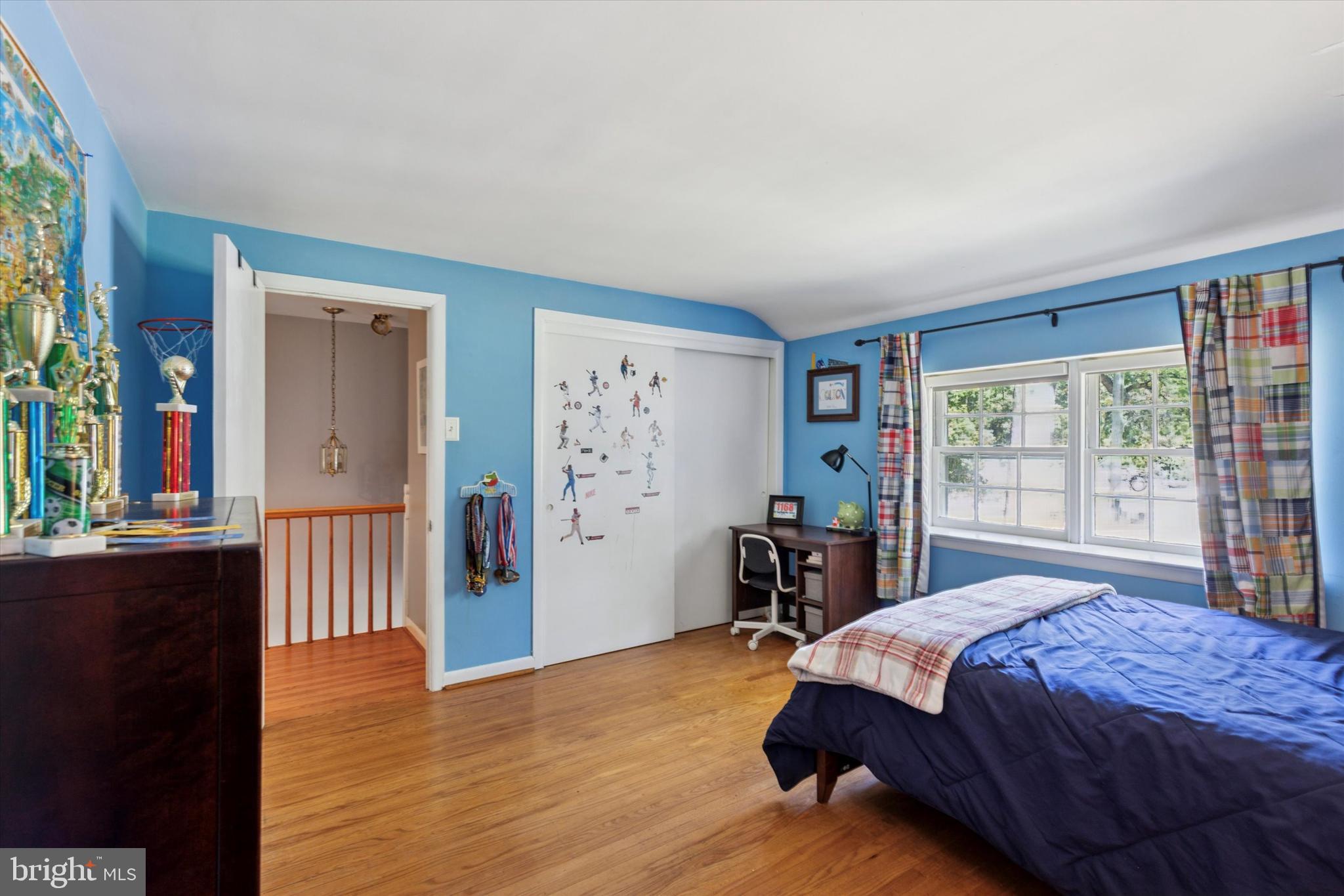 711 Custis Road Glenside, PA 19038 - Photo 31 of 53 a bedroom with a bed dresser and a large window