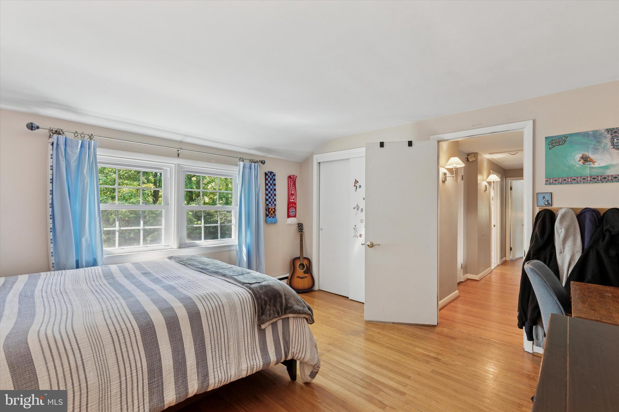 711 Custis Road Glenside, PA 19038 - Photo 32 of 53 a bedroom with a bed and wooden floor