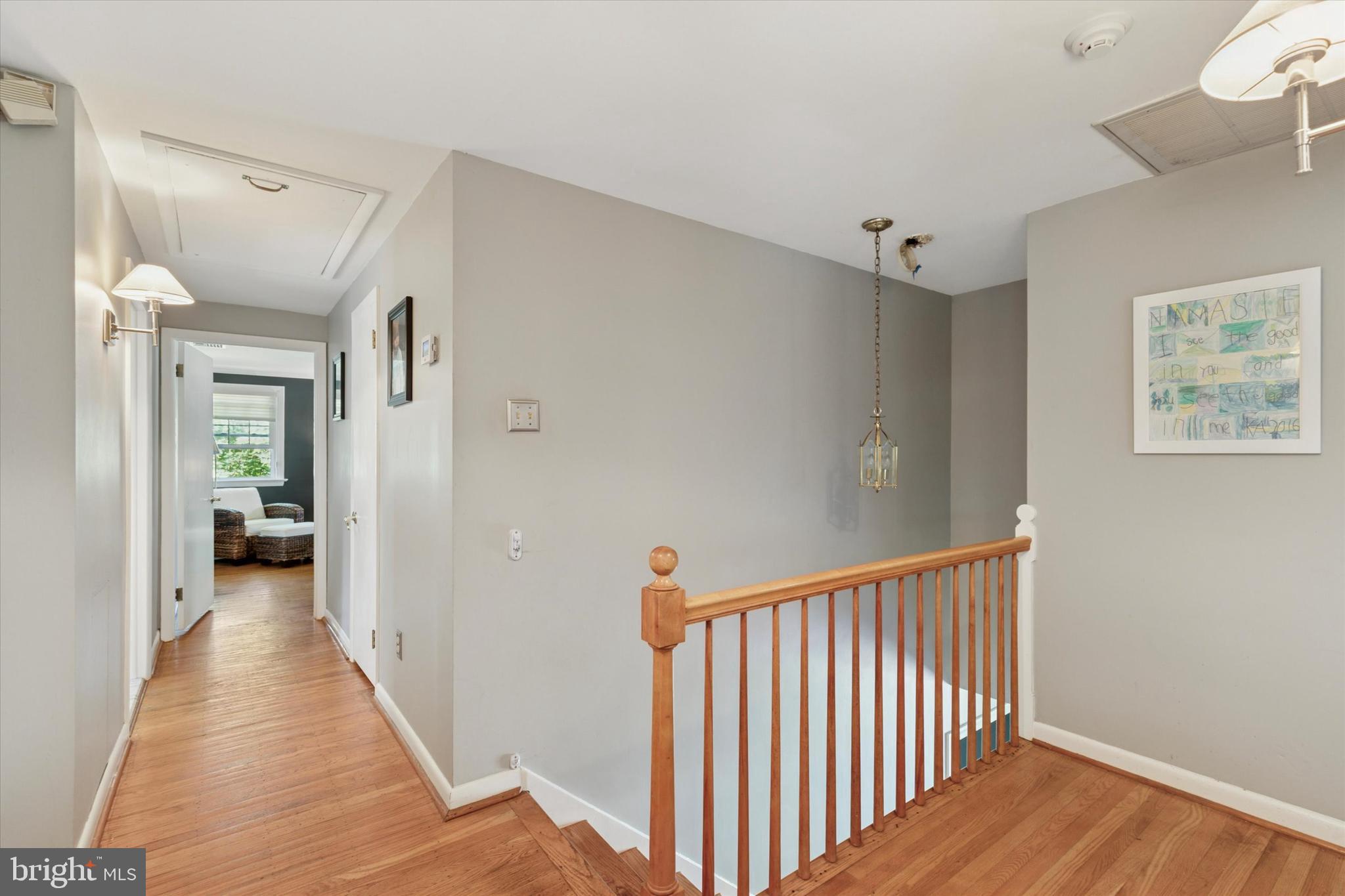 711 Custis Road Glenside, PA 19038 - Photo 35 of 53 a view of a hallway with a wooden floor and entryway