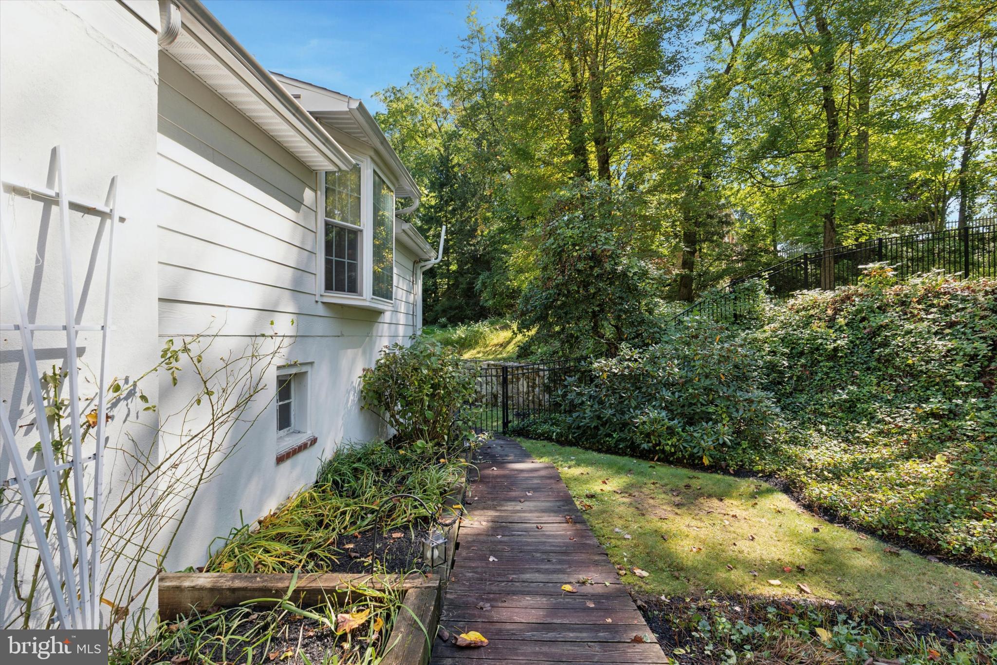 711 Custis Road Glenside, PA 19038 - Photo 40 of 53 a view of a pathway both side of house